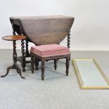 An oak gateleg table, together with a tripod table, a mirror, 36 x 126cm,