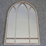 A gothic style garden arched mirror,