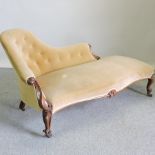 A Victorian mahogany chaise longue, on cabriole legs,