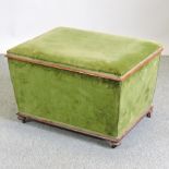 A Victorian green upholstered ottoman,