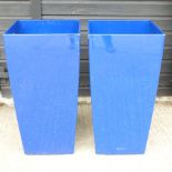A pair of blue garden pots,