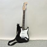A replica Fender style stratocaster electric guitar