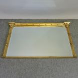 A George III style gilt painted over mantel mirror,