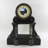 A black slate mantel clock,