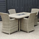 A rattan beige garden table, 150 x 85cm, with integral drinks tray, together with four chairs,