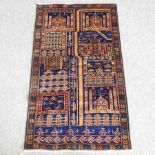 An oriental carpet, with geometric designs, on a blue ground,