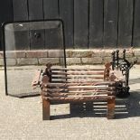 A wrought iron fire grate, 63cm,