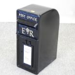 A black painted metal reproduction postbox