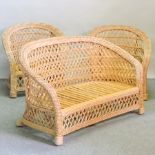 A wicker conservatory sofa, 134cm,