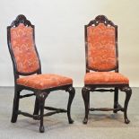 A set of eight red floral upholstered high back dining chairs
