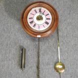 A postman's alarm clock, with a pink dial,