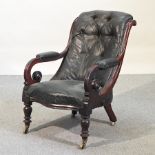 A Victorian mahogany and green upholstered armchair