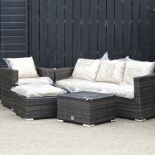 A rattan three seater sofa, 182cm, together with an armchair,