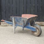 A vintage wooden wheelbarrow