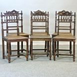 A set of six Victorian oak dining chairs,