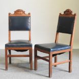 A set of four oak brown leather upholstered dining chairs