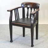 A mahogany desk chair,