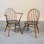 A collection of six Ercol dark elm dining chairs