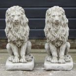 A pair of reconstituted stone garden models of lions,