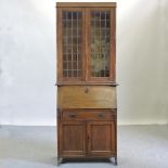 An Edwardian oak bureau bookcase,