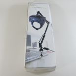 A table magnifier lamp,