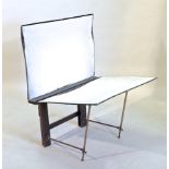 An early 20th century folio stand, with brass supports,