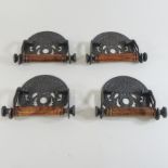 A set of four reproduction GWR metal toilet roll holders,
