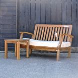 A teak Balmoral garden bench, with a loose cushion, 150cm,