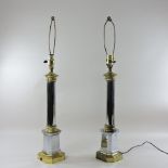 A pair of chromed table lamps,