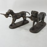 A set of two cast iron models of retrievers,