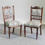 A set of six Edwardian tapestry upholstered dining chairs