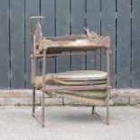A set of early 20th century iron blacksmith bellows, to include tools,