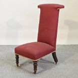 A Victorian red upholstered prie dieu