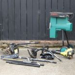 A collection of power tools, to include a Bosch shredder, a Ryobi strimmer and accessories,