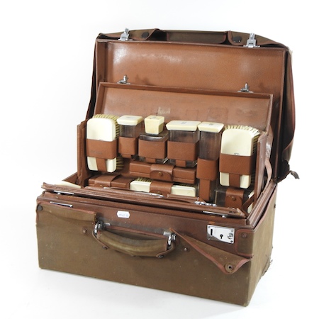 An early 20th century gentleman's leather dressing case, with a fitted interior,