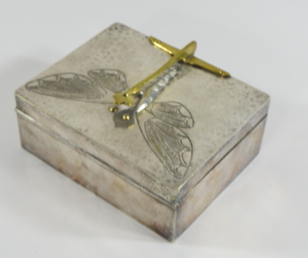 An early 20th century pewter box and cover, decorated in relief with a butterfly, - Image 6 of 6