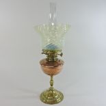 An early 20th century copper and brass oil lamp, by W A S Benson, RD182984, stamped BENSON to base,