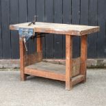 A workbench, fitted with a vice,