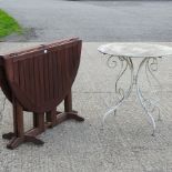 A teak folding garden table, 117cm,