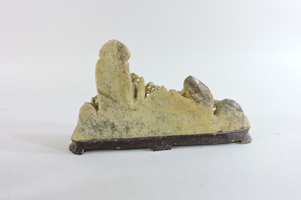 A Chinese soapstone carving of a rocky landscape, with buildings, trees and mountains, 22cm wide, - Image 5 of 13