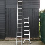 A aluminium extending ladder, 590cm long overall,