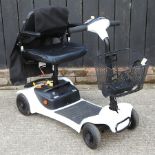 A white Ultralite 480 electric mobility scooter