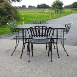 A black painted metal garden table,