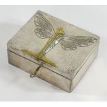 An early 20th century pewter box and cover, decorated in relief with a butterfly,