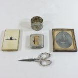 A collection of items to include a silver vesta and an RAF cigarette case
