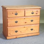 An antique pine chest of drawers,