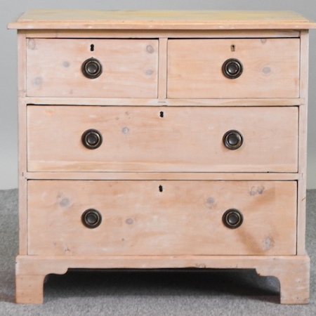 A small Edwardian satin walnut chest of drawers,