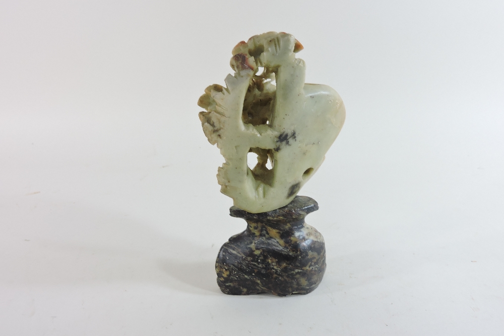 A Chinese soapstone carving of a rocky landscape, with buildings, trees and mountains, 22cm wide, - Image 12 of 13