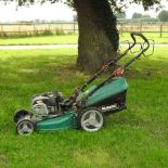 A Qualcast electric start petrol lawn mower