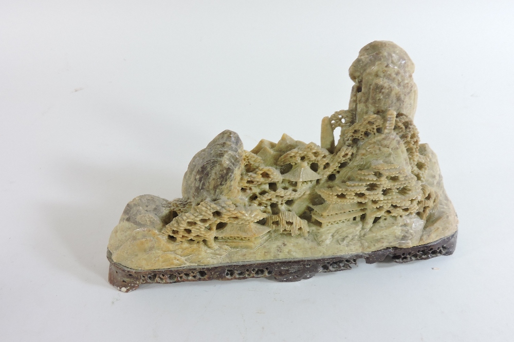 A Chinese soapstone carving of a rocky landscape, with buildings, trees and mountains, 22cm wide, - Image 8 of 13